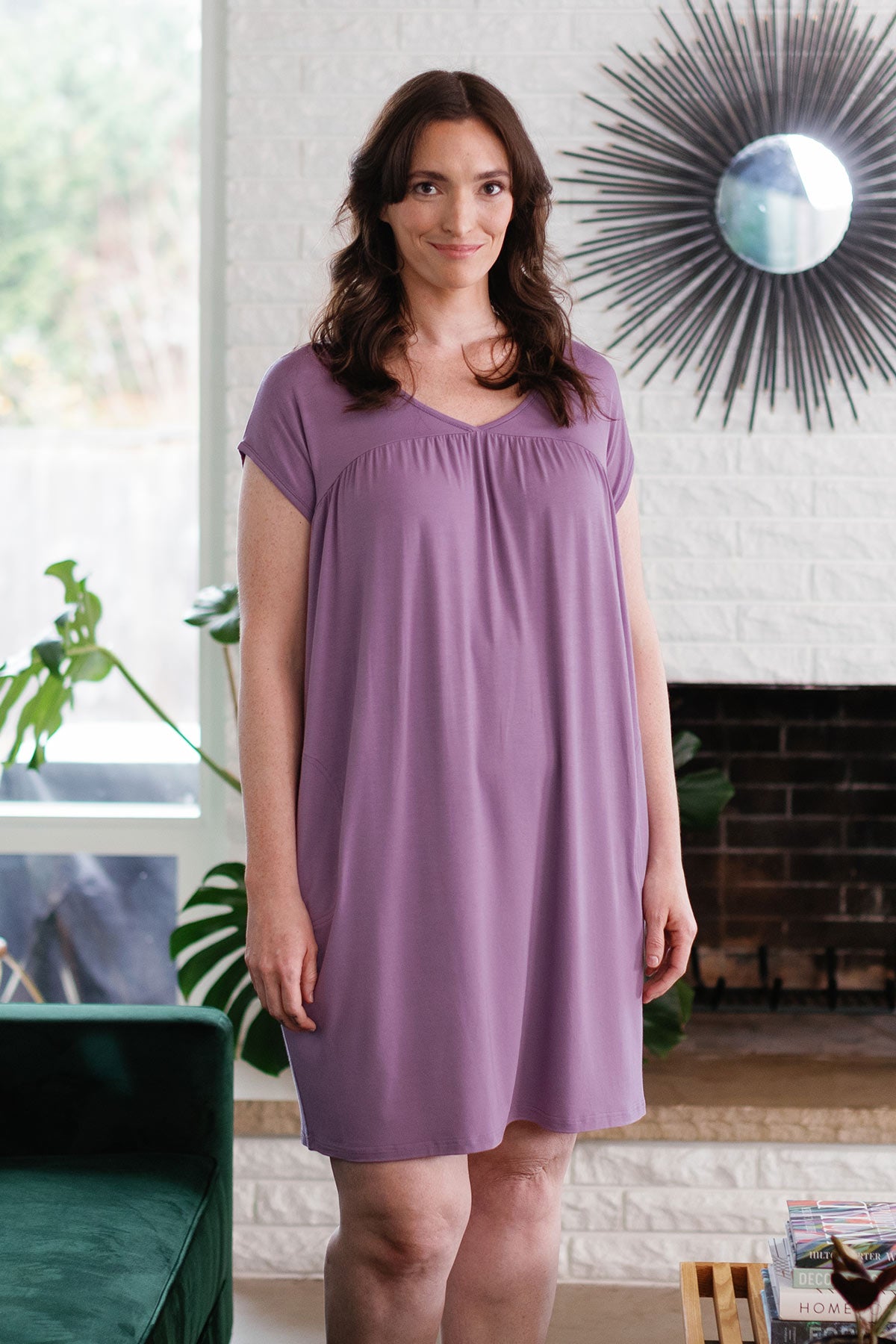 A woman standing with both hands at her sides, wearing Yala Naomi V-Neck Babydoll Bamboo Nightgown in Orchid